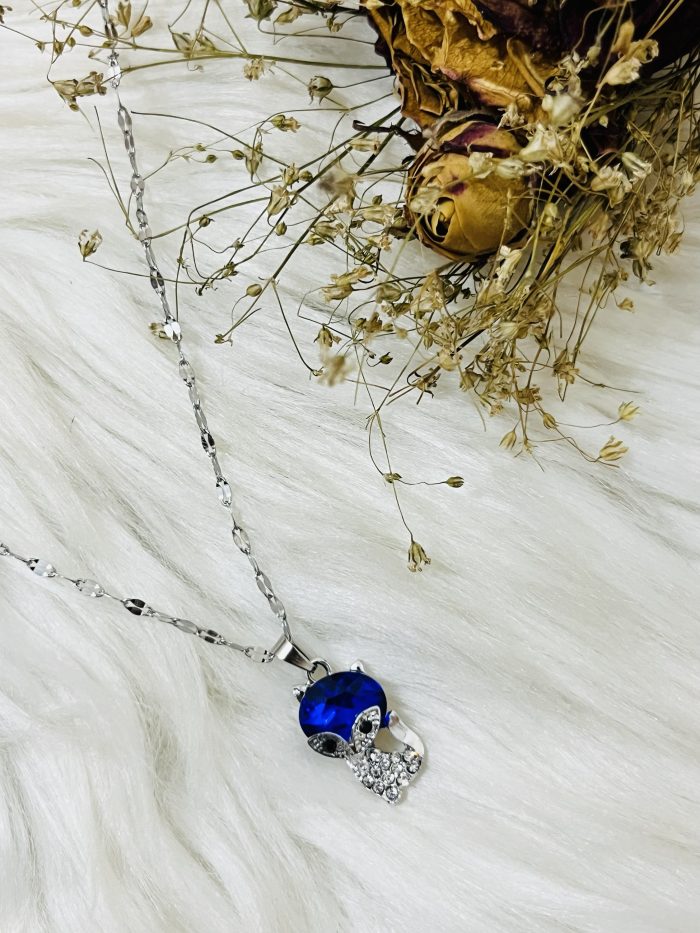 Cute little cat pendant with stainless steel necklace.