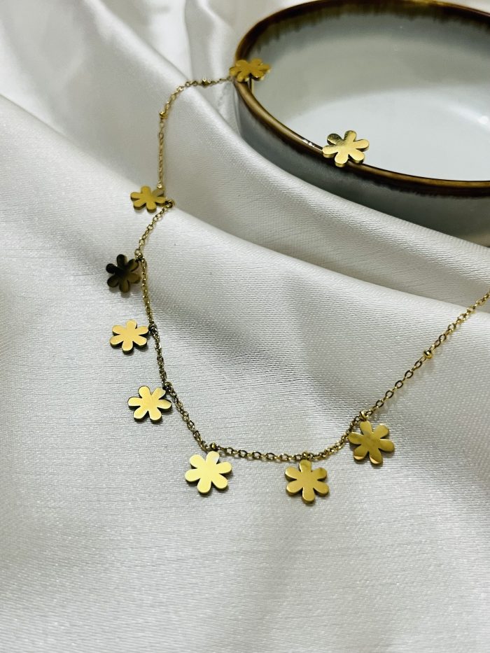 Titanium 22k gold polished imported pendant set with 6 months color guarantee.
