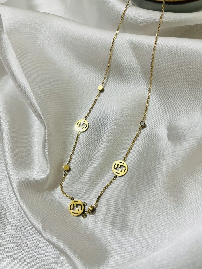 Titanium 22k gold polished stainless steel imported pendant with chain . 6 months + Color guaranteed