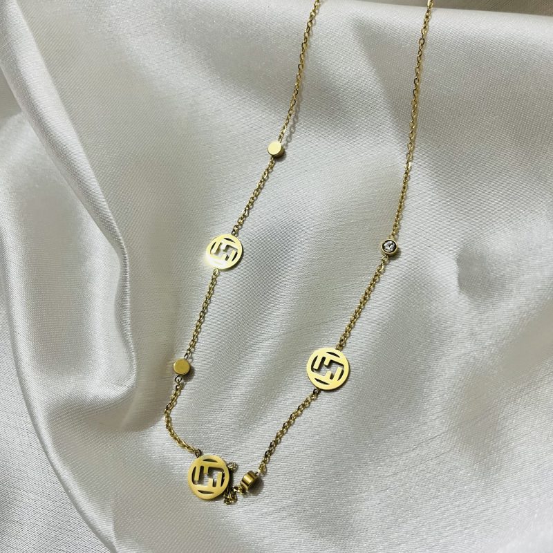 Titanium 22k gold polished stainless steel imported pendant with chain . 6 months + Color guaranteed