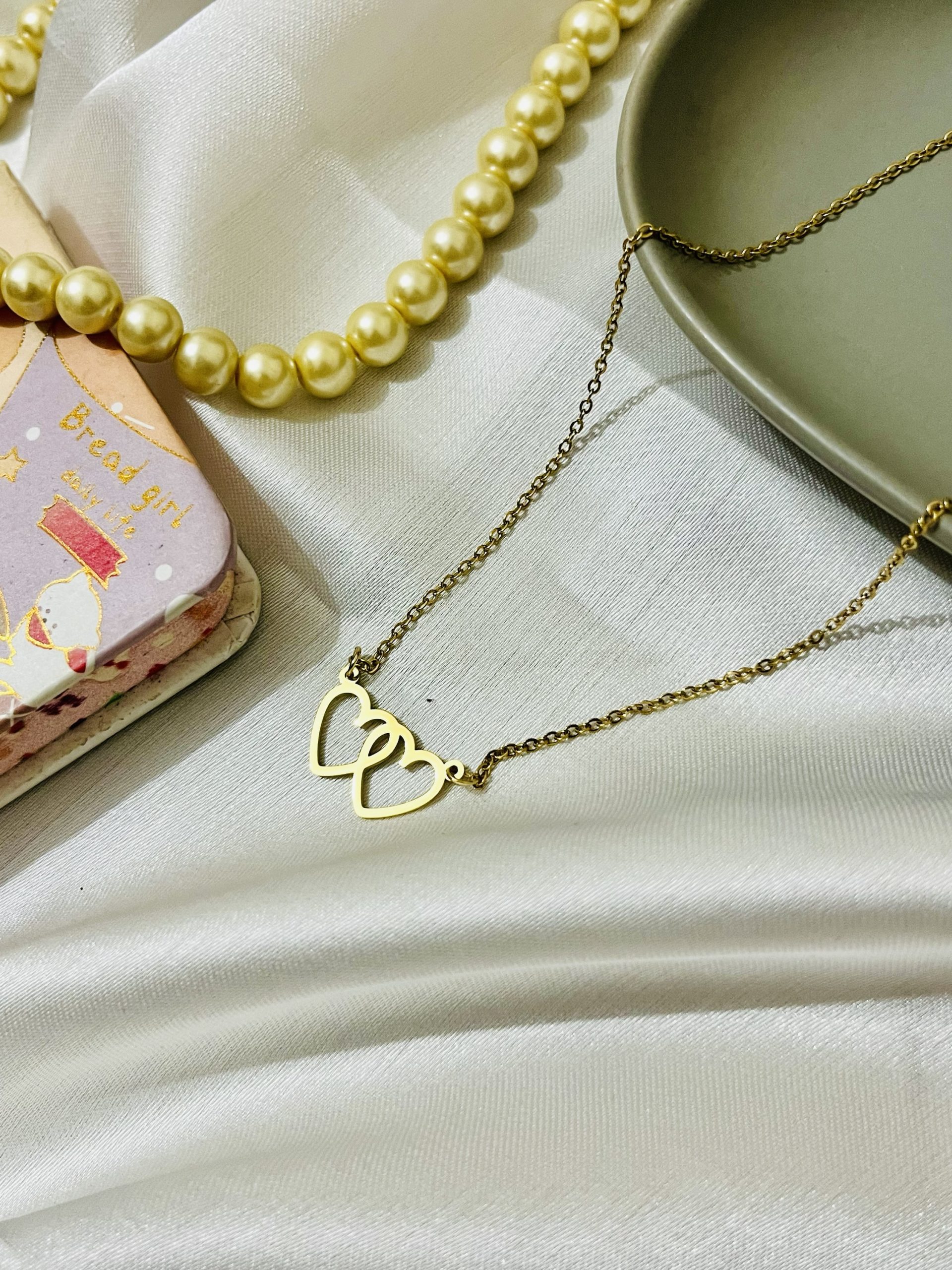 Heart shape Titanium 22k gold polished imported stainless steel pendant with 6 months color guarantee. - Image 2