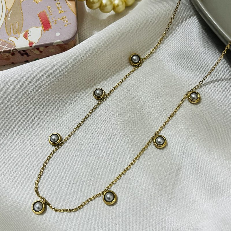 Titanium 22k gold polished stainless steel imported pendant with 6 months color guarantee.