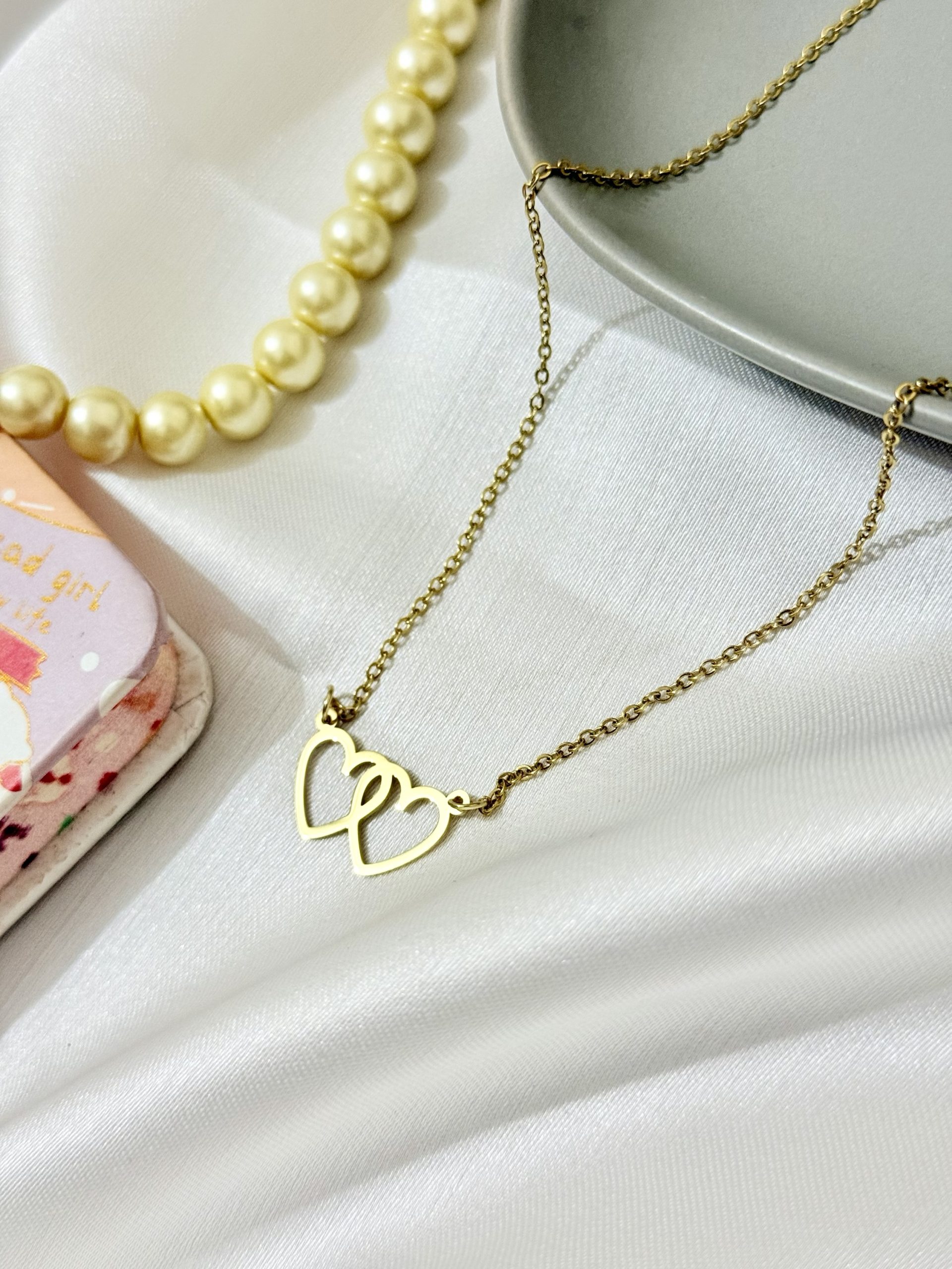 Heart shape Titanium 22k gold polished imported stainless steel pendant with 6 months color guarantee.