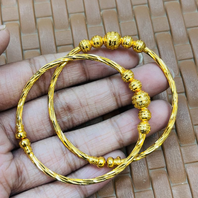 2 pieces baby bangles set with color guarantee. Original gold plated